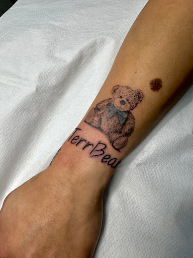 Explore black mens tattoo ideas, creative tattoo ideas in Richland, available at The Green Room Tattoo Lounge