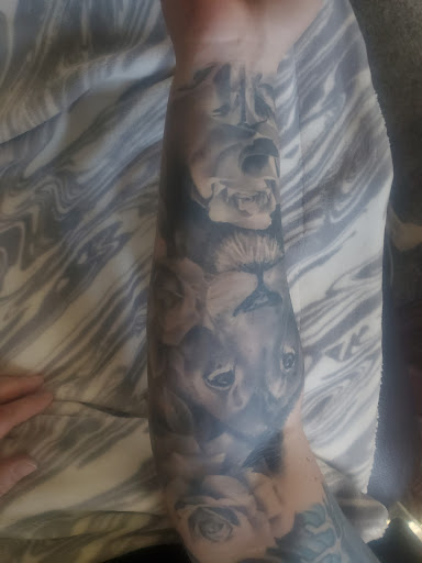 Explore joker card tattoo ideas, creative tattoo ideas in Spokane, available at Anchored Art Tattoo