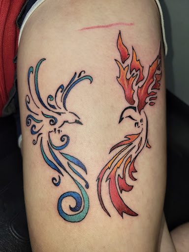 Explore tattoo ideas names on arm, creative tattoo ideas in Angola, available at Hoodlum Ink