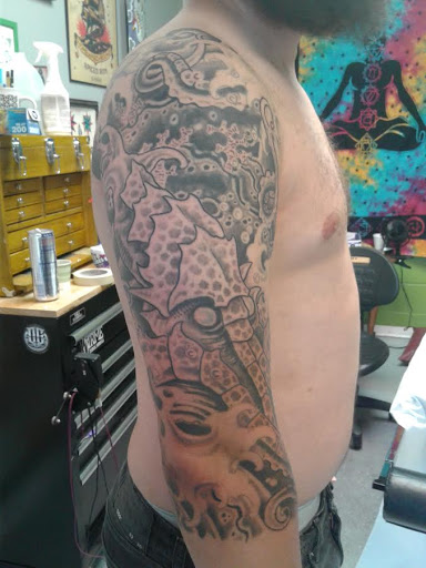 Explore full back tattoo ideas for men, creative tattoo ideas in League City, available at Zen Body Art & Adornment Tattoo Shop
