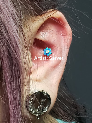 Explore trident tattoo ideas, creative tattoo ideas in Ottawa, available at Precision Art