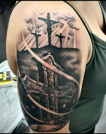 Explore mens upper arm tattoo ideas, creative tattoo ideas in Silver Spring, available at Fattys Tattoos & Piercings Silver Spring