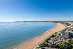 Foto di Spiaggia di Swansea con baia lunga