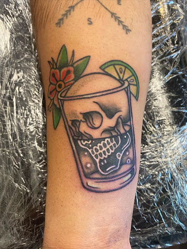 Explore pretty flower tattoo ideas, creative tattoo ideas in Davenport, available at Fine Ink Studios Tattoos