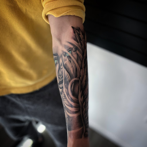 Explore small medium tattoo ideas, creative tattoo ideas in Belleville, available at Dark Horse Tattoo Company, LLC