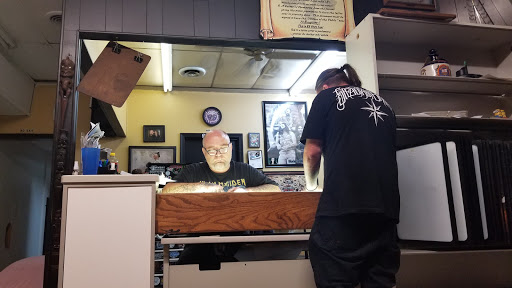 Tattoo Shop «Jolly Roger Tattoo Shop», reviews and photos, 1000 Old Mayfield Rd, Paducah, KY 42003, USA
