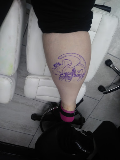 Explore film tattoo ideas, creative tattoo ideas in Foley, available at Symbolic Ink Tattoo Studio