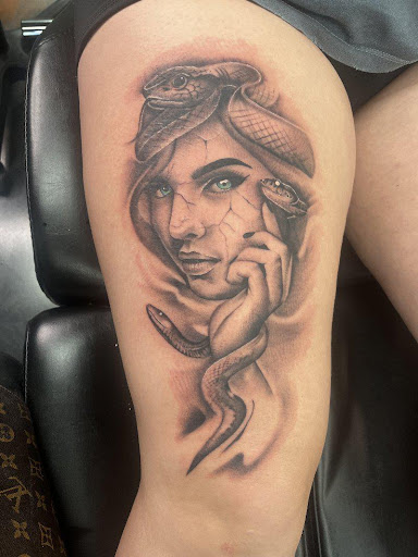 Explore fishing tattoo ideas for females, creative tattoo ideas in Cincinnati, available at UniquInk Tattoos & Piercings