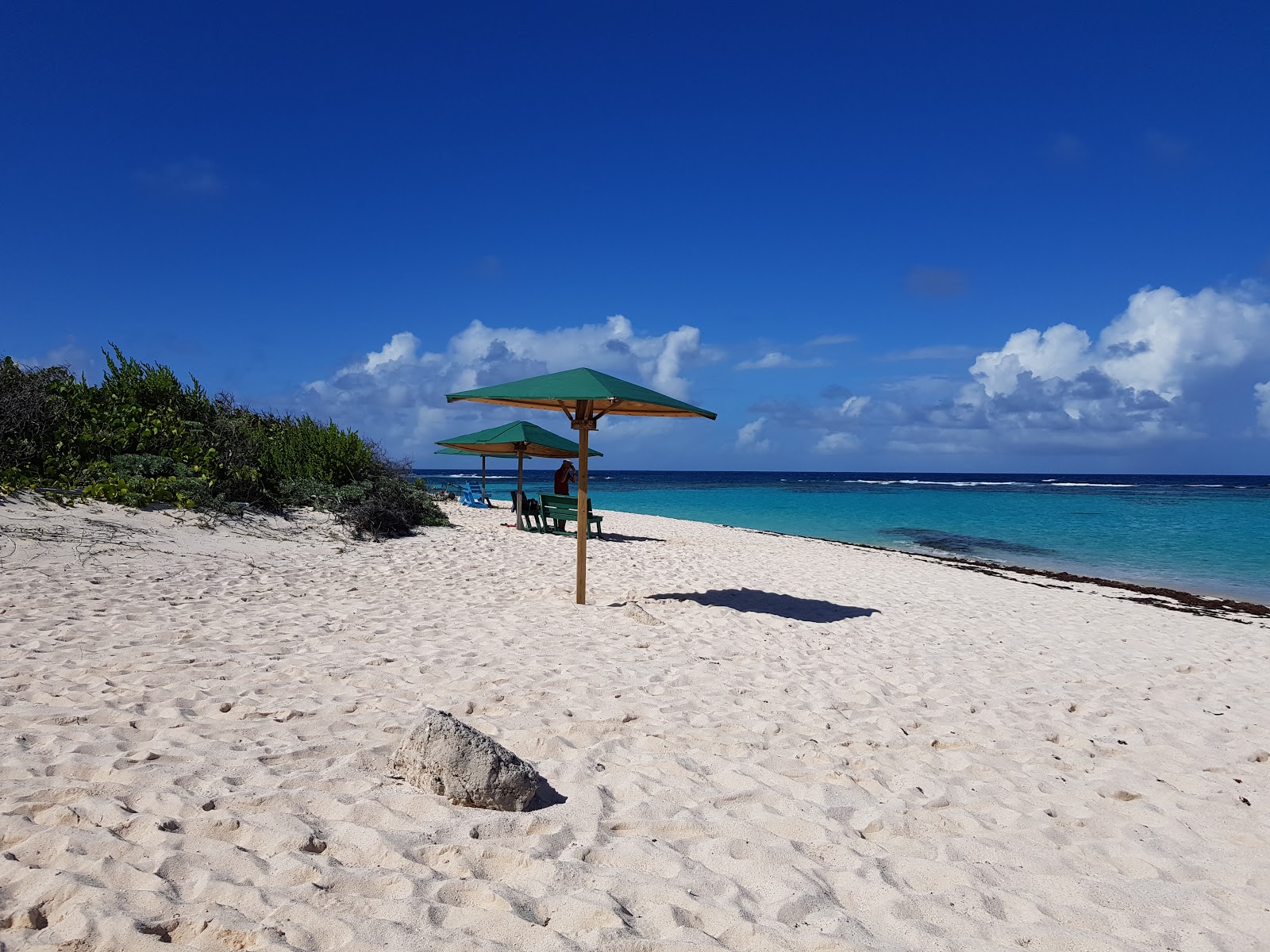 Photo of Neptunes Treasure with turquoise pure water surface