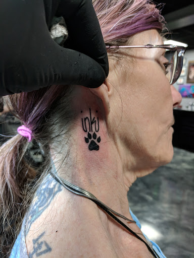 Explore spine tattoo ideas for men, creative tattoo ideas in Edgewood, available at Evolved Body Arts