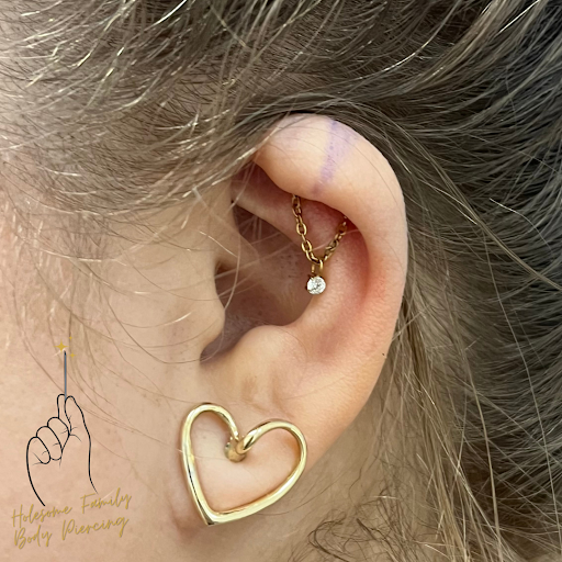 Explore hip thigh tattoo ideas, creative tattoo ideas in Seneca, available at Holesome Family Body Piercing