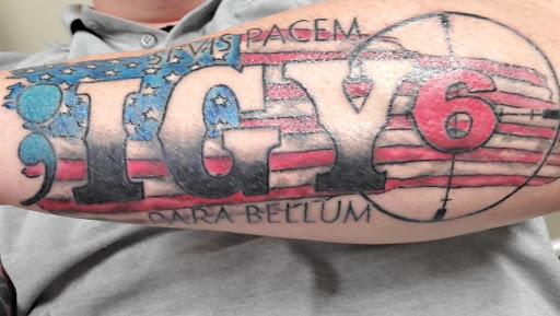 Explore cherub angel tattoo ideas, creative tattoo ideas in Charleston, available at Nemesis Tattoo and Art Gallery