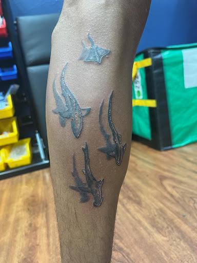 Explore sea tattoo ideas, creative tattoo ideas in Cocoa, available at Rorschach Tattoo Shop and Piercing Studio