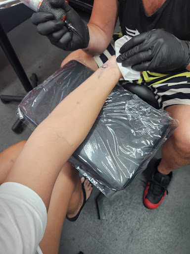 Explore hot guys tattoo ideas, creative tattoo ideas in Panama City Beach, available at Revolution Tattoo & Body Piercing