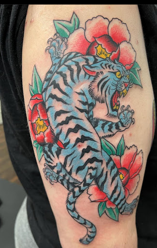 Explore black cover up tattoo ideas, creative tattoo ideas in Delmar, available at Resolute Tattoo