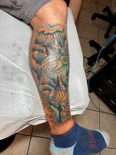 Explore tattoo flower ideas, creative tattoo ideas in Valdosta, available at PATRIOT TATTOOER