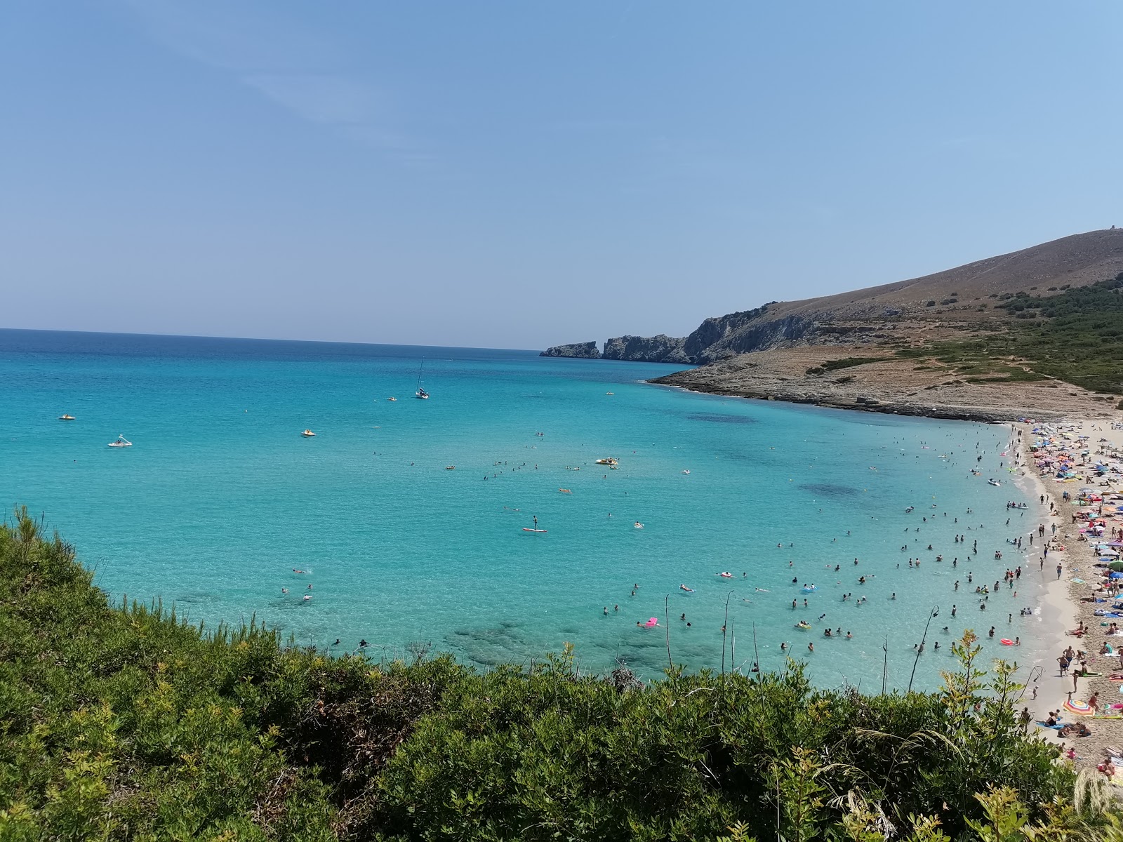 Foto av Cala Mesquida med ljus fin sand yta