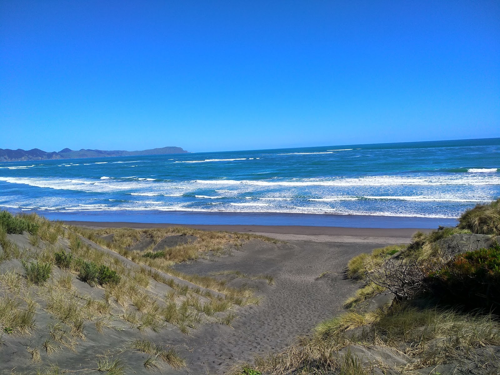 Kawhia Hot Water Beach的照片 背靠悬崖