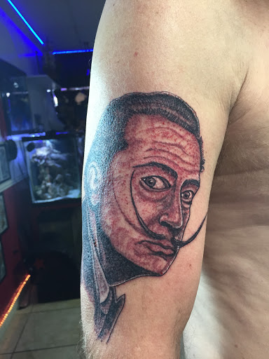 Explore koi tattoo ideas, creative tattoo ideas in Homestead, available at Born Lucky Tattoo Studio