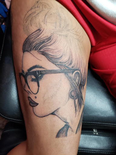 Explore dead dog tattoo ideas, creative tattoo ideas in Bellevue, available at The Electric Ink Society