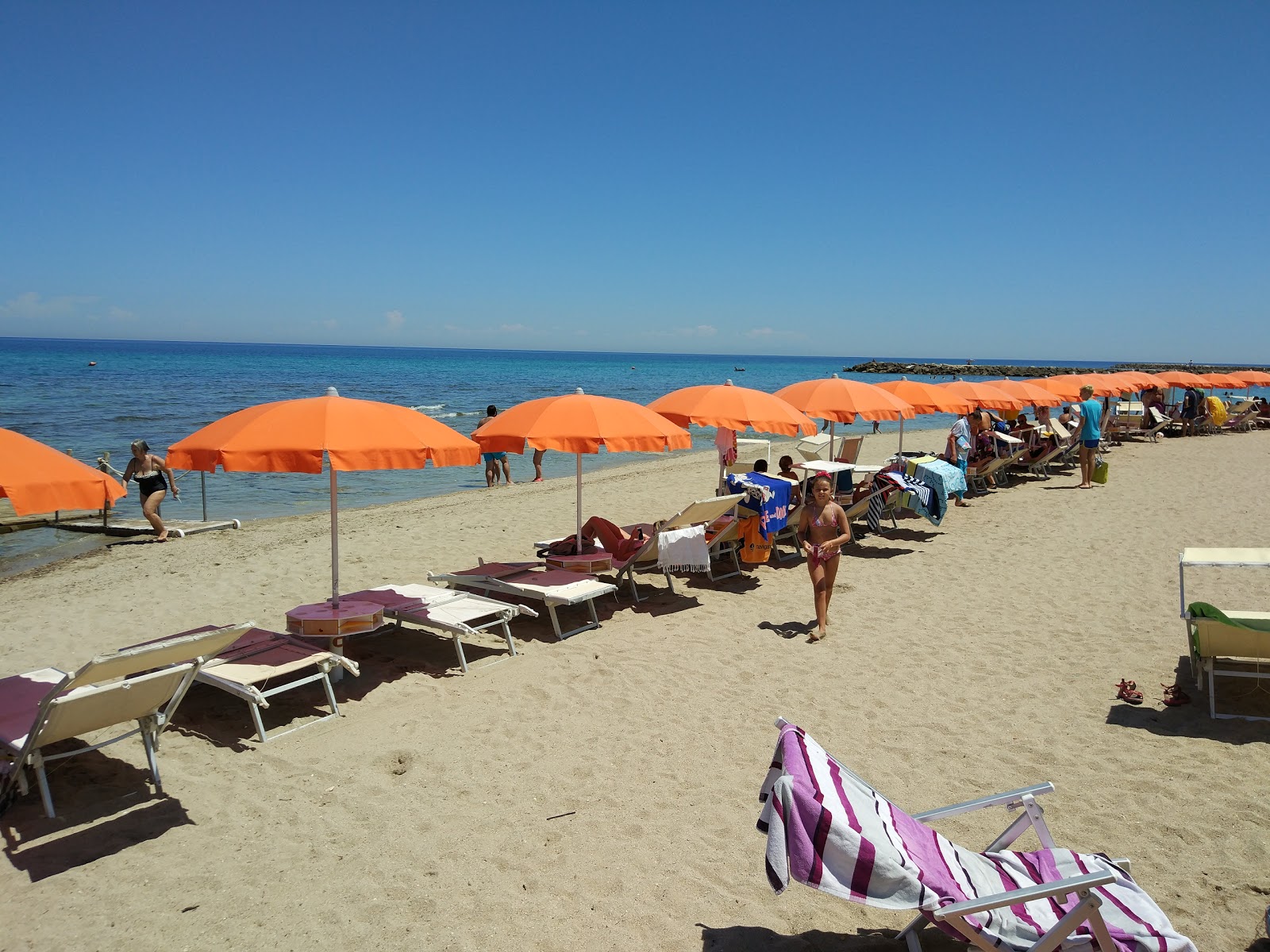 Spiaggia San Cataldo'in fotoğrafı doğal alan içinde bulunmaktadır