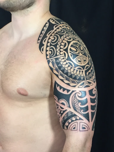 Explore ideas for ankle tattoos, creative tattoo ideas in Laramie, available at Vintage Electric Tattoo