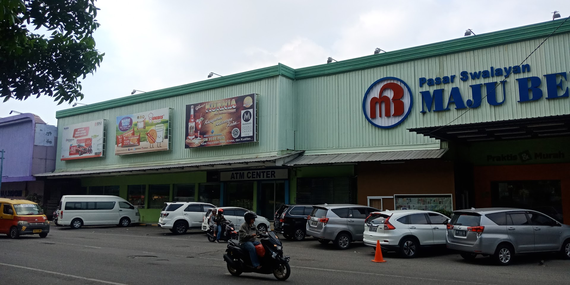 Pasar Swalayan Maju Bersama Merak Jingga Photo