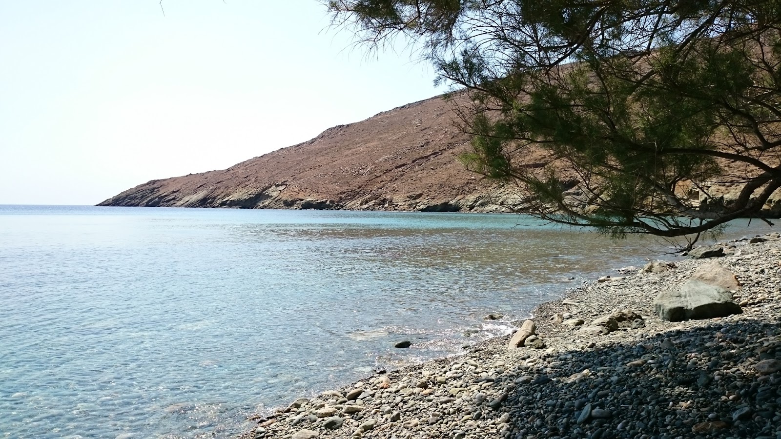 Kentarchos beach'in fotoğrafı turkuaz saf su yüzey ile