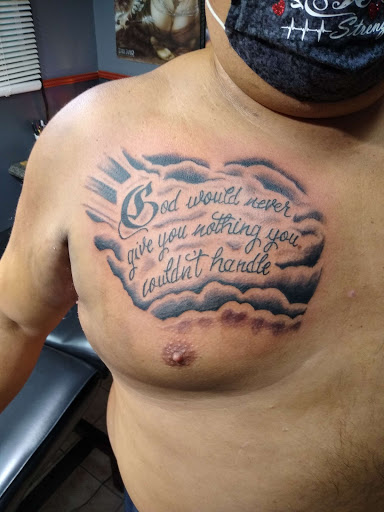 Explore ripped skin tattoo ideas, creative tattoo ideas in Bethlehem, available at Southside Ink