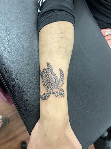 Explore tombstone tattoo ideas, creative tattoo ideas in Cocoa, available at Rorschach Tattoo Shop and Piercing Studio