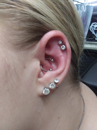 Explore tattoo ideas for growth, creative tattoo ideas in Ottumwa, available at Be You Body Piercing & Jewelry