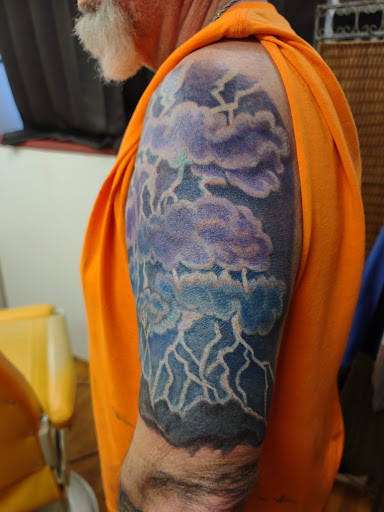 Find wolf tattoo idea for your next unique tattoo in East Bend at Queen Bee Piercing and Tattoo