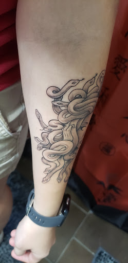 Explore compass tattoo cover up ideas, creative tattoo ideas in Northport, available at Cynical Tattoos Shop