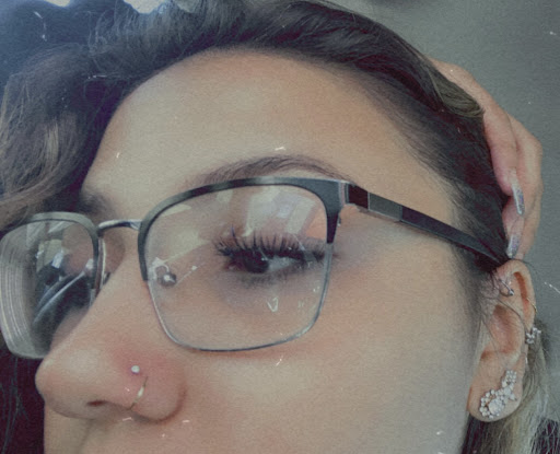 Explore throat tattoo ideas for females, creative tattoo ideas in Rock Island, available at Quad City Pierce Pro Nick
