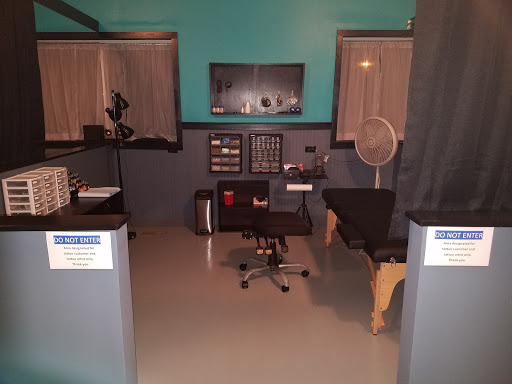 Explore cycle tattoo ideas, creative tattoo ideas in Spencer, available at Inkorporated Body Art