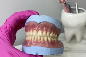 Tukang gigi fajar dental image