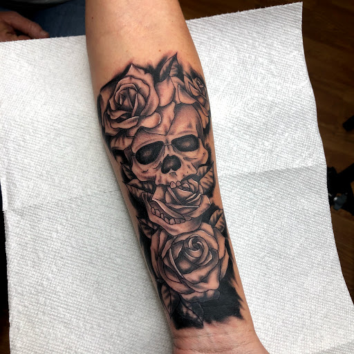 Explore simple motorcycle tattoo ideas, creative tattoo ideas in Apple Valley, available at Tried and True Tattoo Parlor