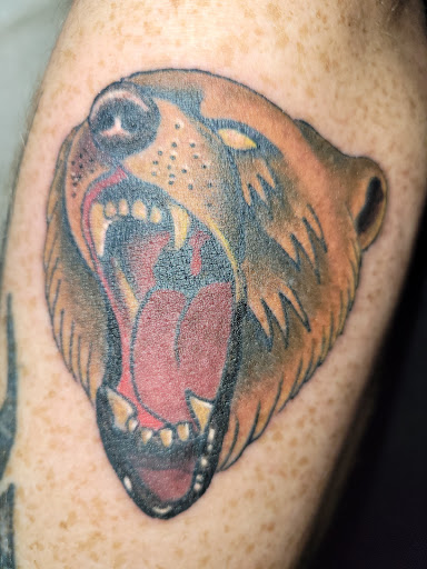 Explore male family tattoo ideas, creative tattoo ideas in Angola, available at Hoodlum Ink