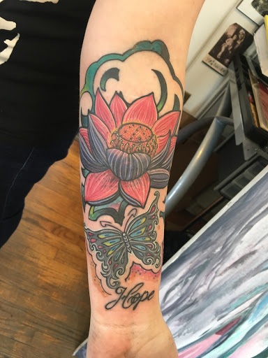 Explore flame tattoo ideas, creative tattoo ideas in Milford, available at Golden Hammer Tattoo Studios