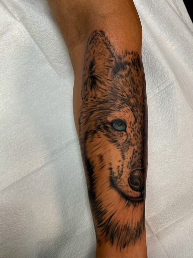 Explore stargazer lily tattoo ideas, creative tattoo ideas in Richland, available at The Green Room Tattoo Lounge