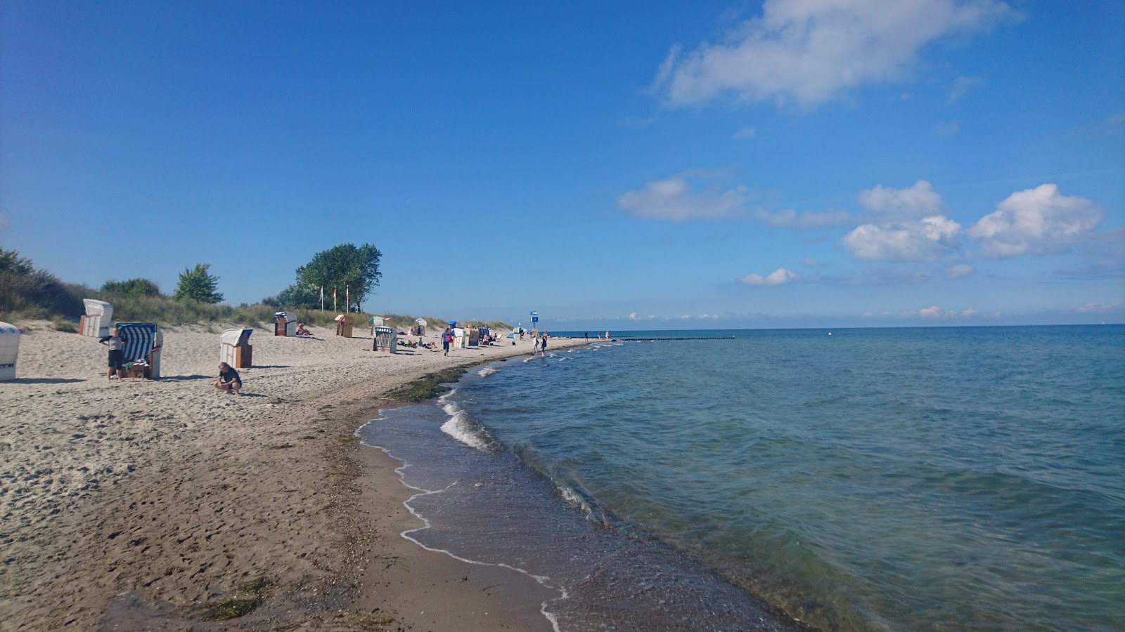 Heiligen Hafen Strand的照片 带有明亮的沙子表面