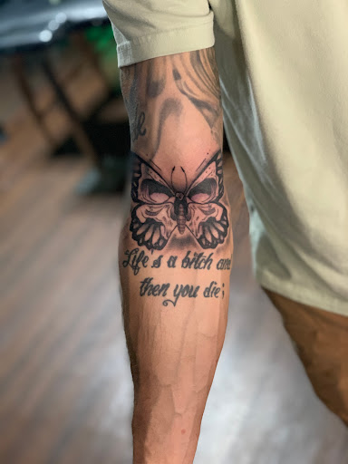 Find dog tattoo idea for your next unique tattoo in Roscoe at Elevated Ink Tattoo