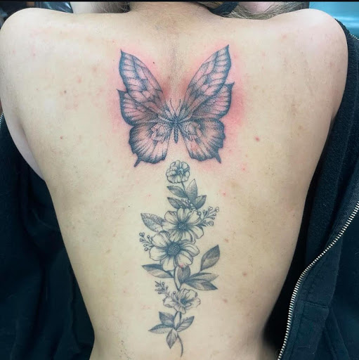 Explore face tattoos above eyebrow tattoo ideas, creative tattoo ideas in Fresno, available at American High Voltage Tattoo