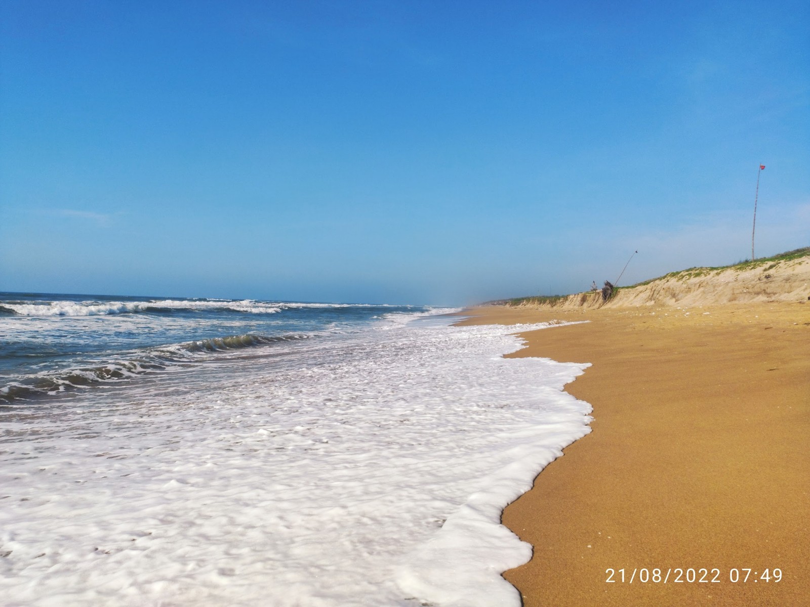Fotografija Dhabaleshwar Beach z turkizna čista voda površino