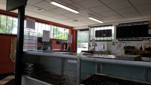 Tattoo Shop «Ink Slingers», reviews and photos, 1355 E Kearney St, Springfield, MO 65803, USA