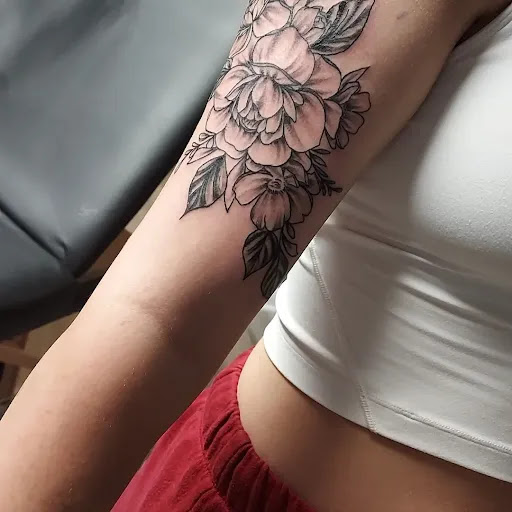 Explore harmonica tattoo ideas, creative tattoo ideas in Conowingo, available at In Bloom Tattoo