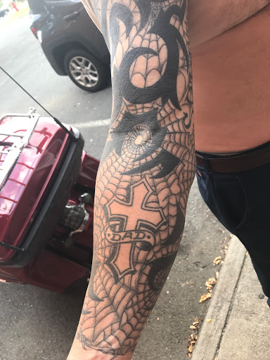 Explore butterfly tattoo ideas for men, creative tattoo ideas in Charlottesville, available at Mystic Tattoo and Body Piercing