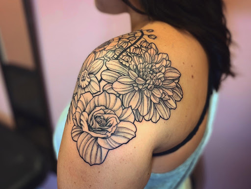 Explore tattooed wedding ring ideas, creative tattoo ideas in Batavia, available at The Pretty Pin-Up Tattoo Parlor