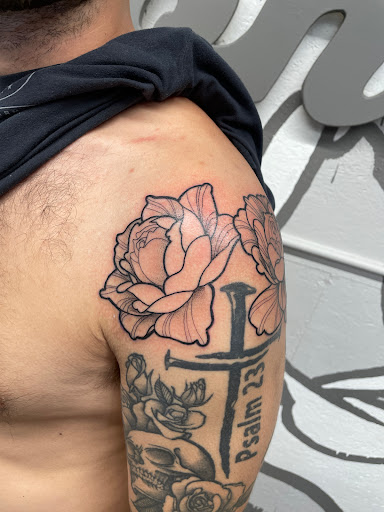 Explore colour tattoo sleeve ideas, creative tattoo ideas in Zumbrota, available at Art by Sinclair Tattoo Artist At Dry Bones Ink