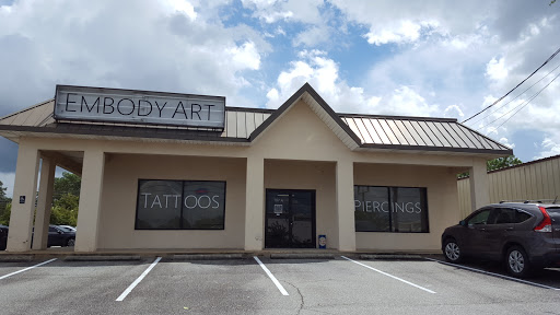 Explore back tattoo ideas for females, creative tattoo ideas in Tifton, available at Embody Art Tattoo Studio